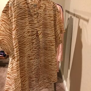 Ladies short sleeve zebra print top with front pocket, button up with collar